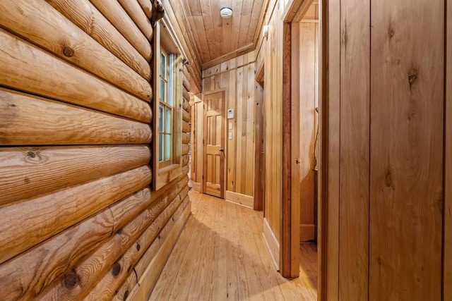 130 Sarah Cove Rd, Otto, NC 28763 - hall with light wood-style flooring, log walls, and wooden ceiling