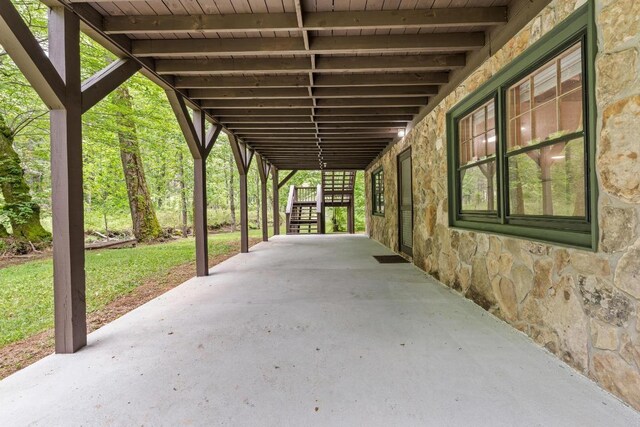 130 Sarah Cove Rd, Otto, NC 28763 - view of patio / terrace with stairway and a carport