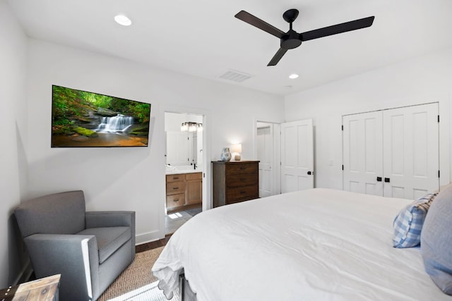 bedroom with ceiling fan, ensuite bath, visible vents, wood finished floors, and recessed lighting