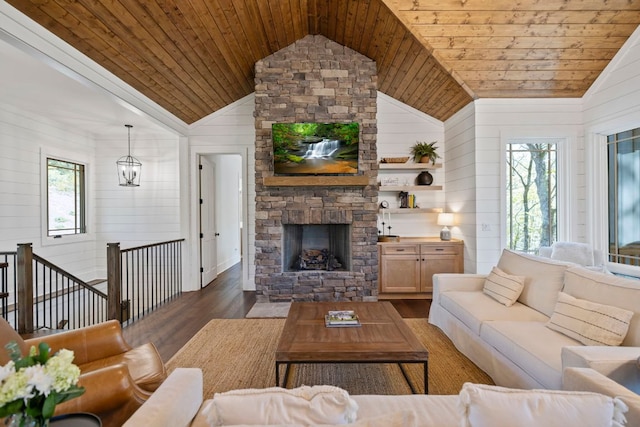 1048 Cherokee Trce, Lake Toxaway, NC 28747 - living area with wooden ceiling, vaulted ceiling, plenty of natural light, wood finished floors, and a fireplace