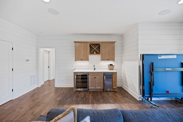 bar featuring refrigerator, indoor wet bar, wooden walls, wine cooler, and dark wood-type flooring
