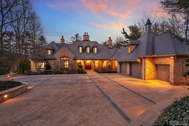 view of french country style house