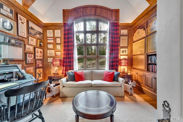 sitting room featuring lofted ceiling