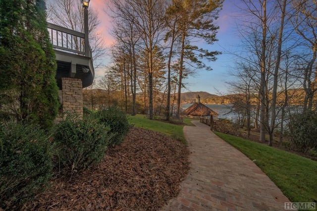 yard at dusk with a mountain view