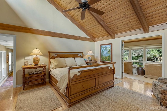 bedroom featuring wood ceiling, light hardwood / wood-style flooring, ceiling fan, beam ceiling, and high vaulted ceiling