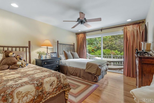 bedroom featuring access to exterior, ceiling fan, and light hardwood / wood-style flooring