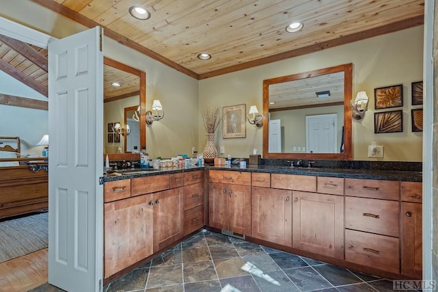 bathroom featuring vanity and wood ceiling