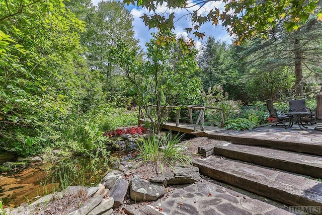 view of yard featuring a deck