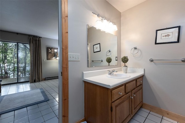 1964 Woods Mountain Trl, Cullowhee, NC 28723 - bathroom with tile patterned floors, vanity, and baseboards