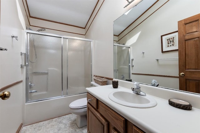 1964 Woods Mountain Trl, Cullowhee, NC 28723 - bathroom featuring toilet, vanity, enclosed tub / shower combo, and crown molding