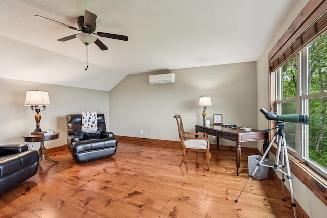 71 Raptor Way, Sapphire, NC 28774 - office area featuring a wall mounted air conditioner, plenty of natural light, a ceiling fan, hardwood / wood-style flooring, and lofted ceiling