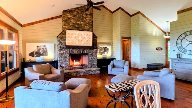 71 Raptor Way, Sapphire, NC 28774 - living room featuring wood walls, wood finished floors, a ceiling fan, a fireplace, and high vaulted ceiling