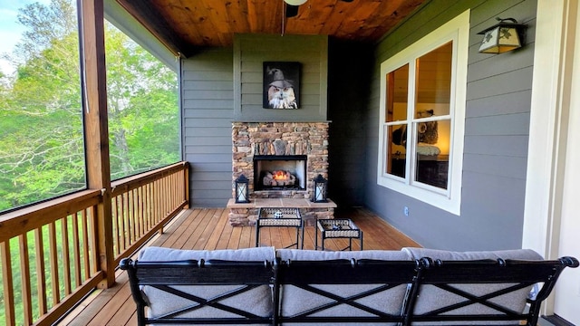 71 Raptor Way, Sapphire, NC 28774 - deck with an outdoor living space with a fireplace