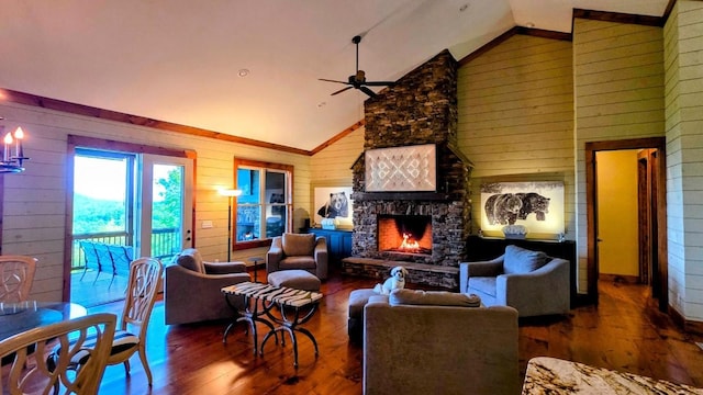 71 Raptor Way, Sapphire, NC 28774 - living room with wooden walls, hardwood / wood-style flooring, an outdoor stone fireplace, high vaulted ceiling, and a ceiling fan