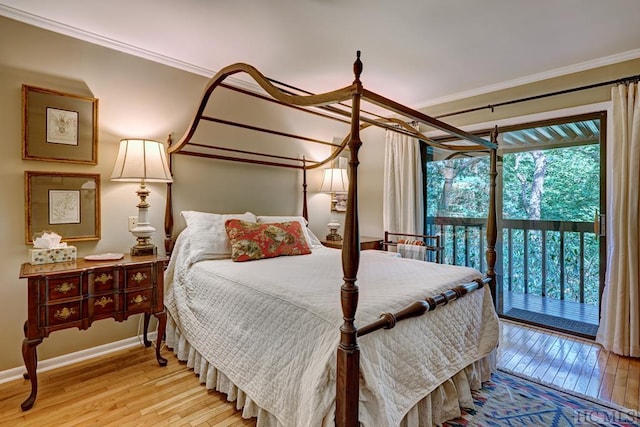 bedroom featuring ornamental molding, light wood-type flooring, and access to outside