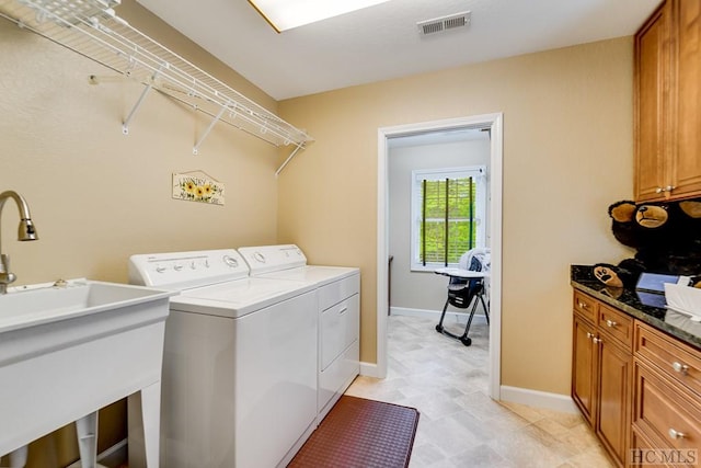 laundry room with washer and clothes dryer