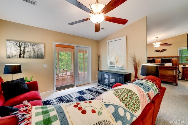 carpeted bedroom featuring ceiling fan, access to outside, and lofted ceiling