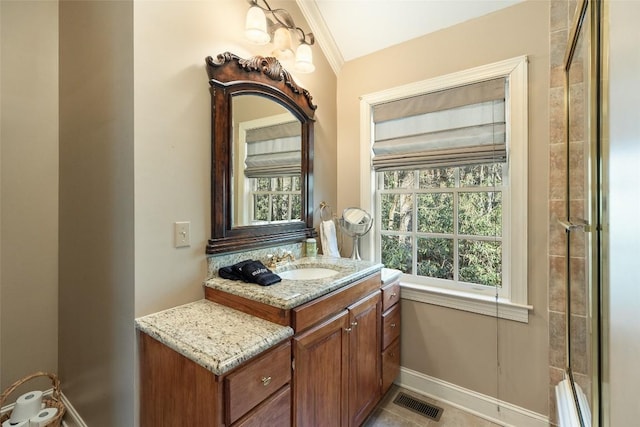 bathroom featuring vanity and crown molding