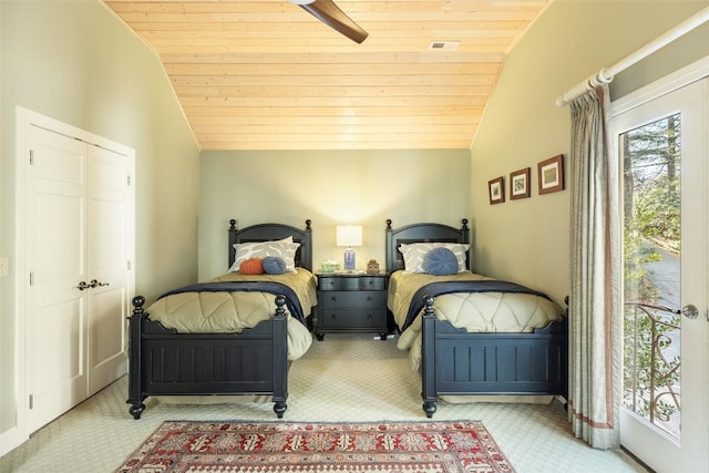 carpeted bedroom with wood ceiling, ceiling fan, and vaulted ceiling