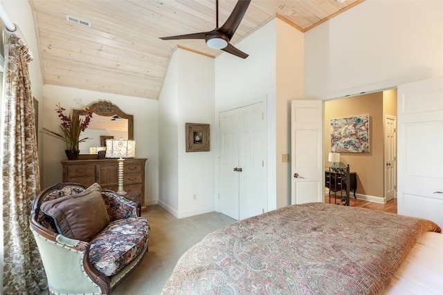 bedroom featuring light carpet, wood ceiling, high vaulted ceiling, and ceiling fan