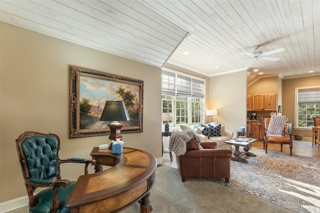 sitting room featuring crown molding, ceiling fan, carpet floors, and wooden ceiling