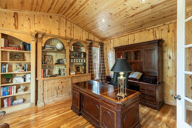 office space with wooden ceiling, light hardwood / wood-style floors, vaulted ceiling, and wood walls