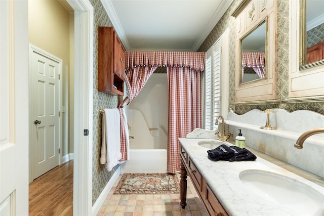 bathroom featuring vanity, ornamental molding, and shower / bathtub combination