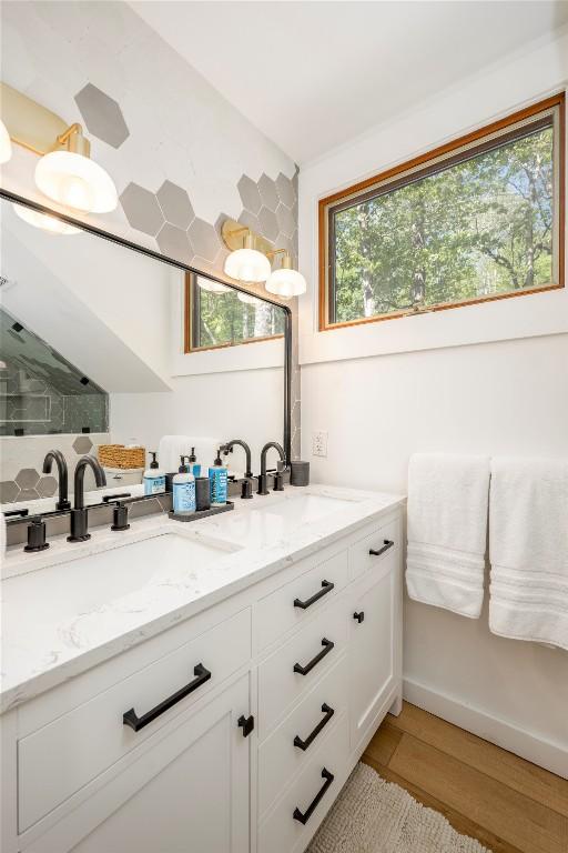79 Azalea Ct, Sapphire, NC 28774 - bathroom featuring double vanity and wood finished floors