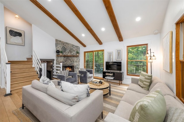 79 Azalea Ct, Sapphire, NC 28774 - living room with light wood-style flooring, a fireplace, recessed lighting, stairs, and baseboards