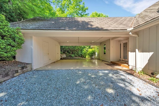 60 Lakeside Trl, Lake Toxaway, NC 28747 - view of car parking featuring a carport and gravel driveway