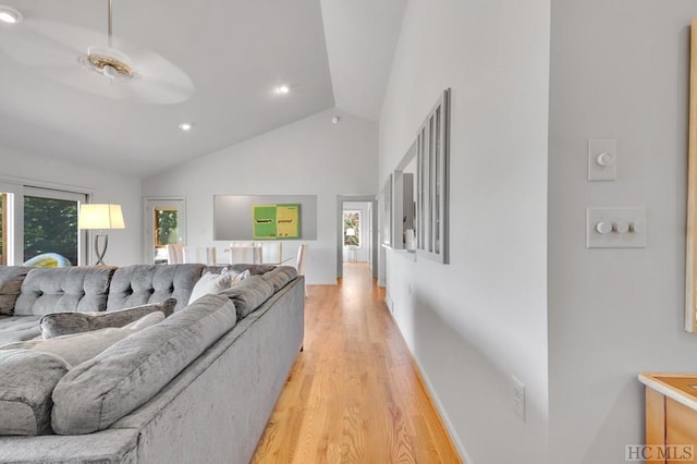 60 Lakeside Trl, Lake Toxaway, NC 28747 - living room featuring light wood-style flooring, recessed lighting, high vaulted ceiling, and baseboards