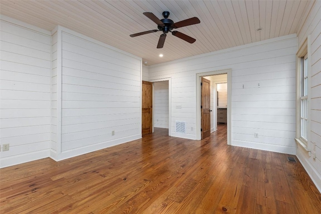 96 Mahalo Ln, Cullowhee, NC 28723 - unfurnished bedroom with wooden walls, wood finished floors, wood ceiling, and baseboards