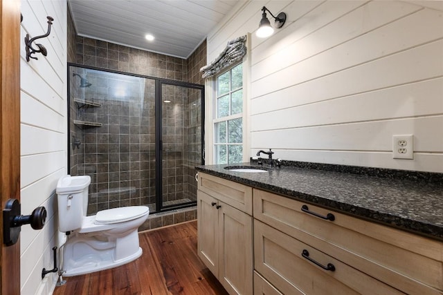 96 Mahalo Ln, Cullowhee, NC 28723 - bathroom with toilet, wood finished floors, a shower stall, vanity, and recessed lighting