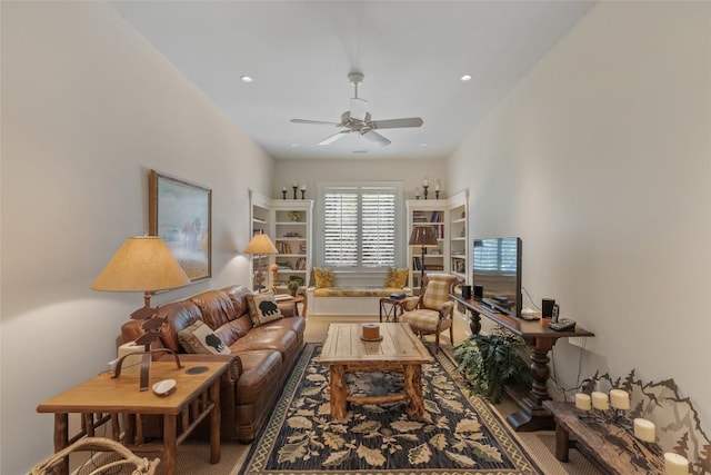 living area featuring recessed lighting and ceiling fan