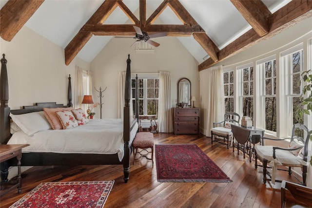 bedroom featuring high vaulted ceiling, ceiling fan, beam ceiling, and hardwood / wood-style floors