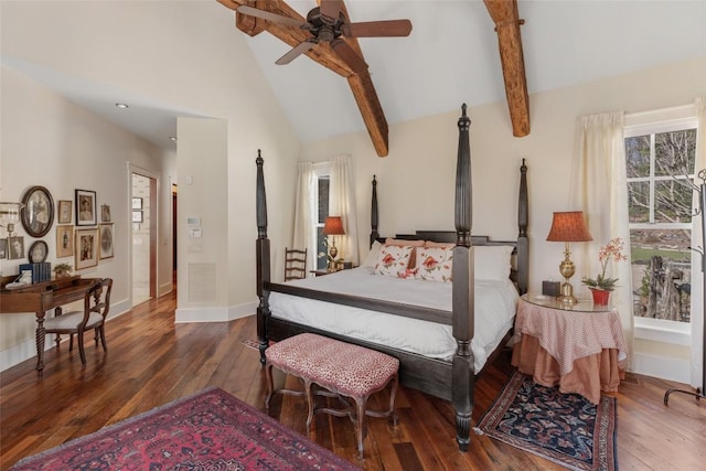 bedroom with baseboards, lofted ceiling with beams, hardwood / wood-style flooring, and visible vents
