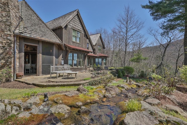 rear view of house with a patio area