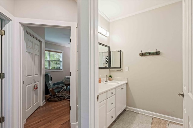 49 Jessamine Ln, Highlands, NC 28741 - bathroom featuring ornamental molding, vanity, baseboards, and wood finished floors