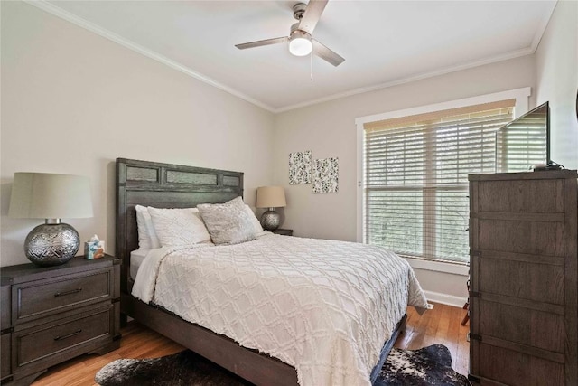 49 Jessamine Ln, Highlands, NC 28741 - bedroom featuring light wood finished floors, ornamental molding, a ceiling fan, and baseboards