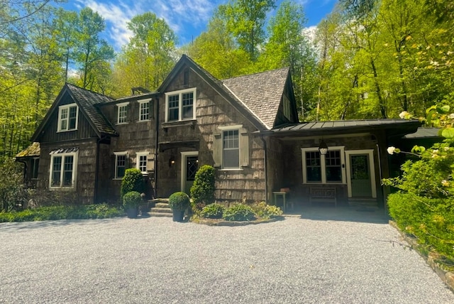 55 Oconee Belle Trl, Glenville, NC 28736 - view of front of property with a standing seam roof, stone siding, and metal roof