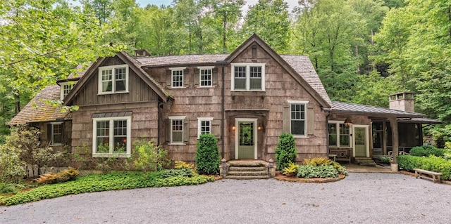 55 Oconee Belle Trl, Glenville, NC 28736 - view of front of home with a chimney, a standing seam roof, and metal roof