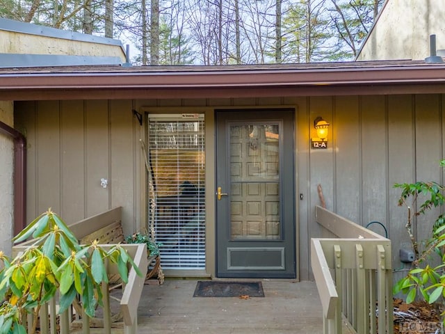 doorway to property with a deck