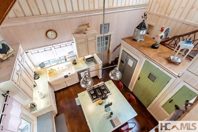 920 Sapphire Post Office Rd, Cashiers, NC 28774 - kitchen with dark wood-type flooring, wooden counters, wood walls, and beamed ceiling