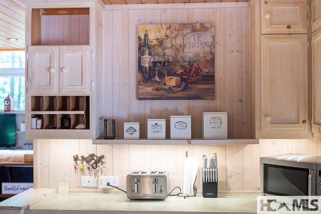 920 Sapphire Post Office Rd, Cashiers, NC 28774 - kitchen featuring stainless steel microwave and wooden walls