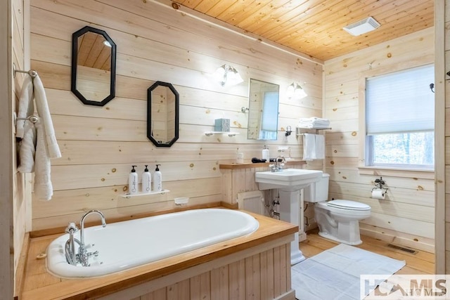 920 Sapphire Post Office Rd, Cashiers, NC 28774 - full bathroom with a garden tub, wooden ceiling, and wooden walls