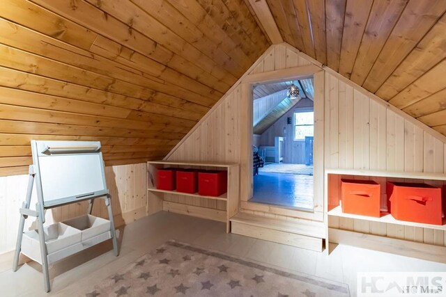 920 Sapphire Post Office Rd, Cashiers, NC 28774 - additional living space with wooden ceiling, wooden walls, and vaulted ceiling
