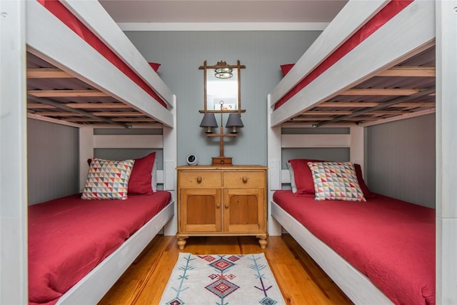 bedroom with light hardwood / wood-style flooring