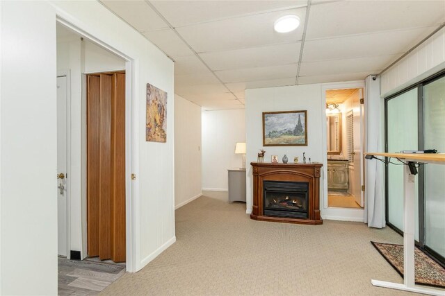 47 Red Bud Ct, Sapphire, NC 28774 - hallway featuring carpet flooring, a paneled ceiling, and baseboards