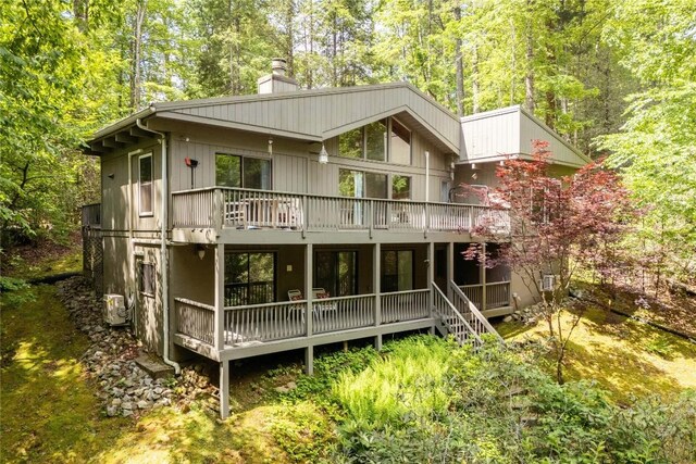 47 Red Bud Ct, Sapphire, NC 28774 - back of house with a chimney and a deck