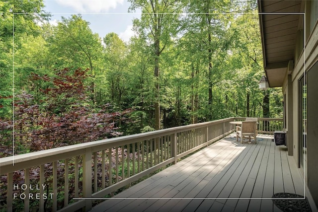 47 Red Bud Ct, Sapphire, NC 28774 - wooden deck with a view of trees